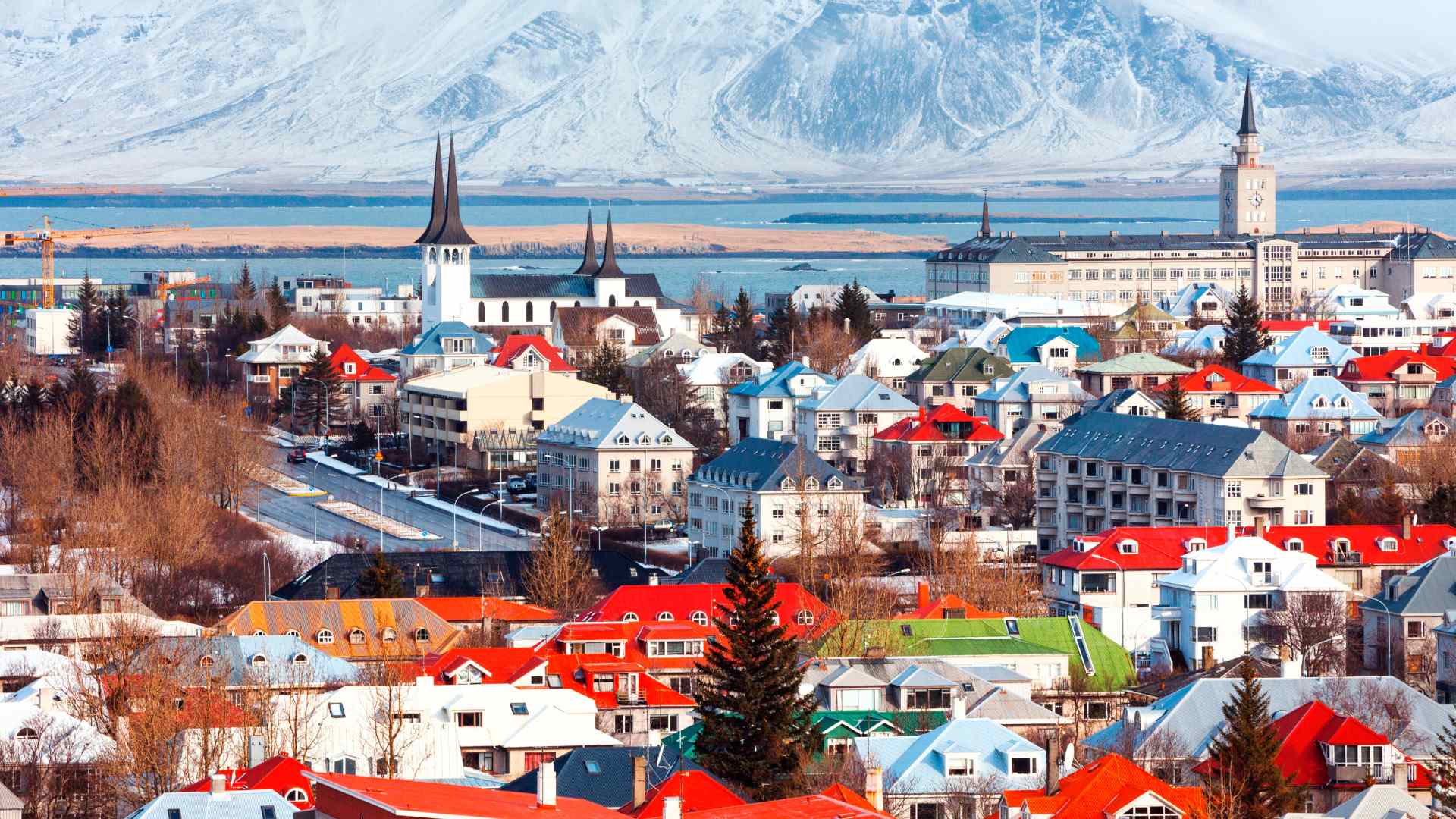 Reykjavik skyline with Hallgrimskirkja and snow-covered mountains