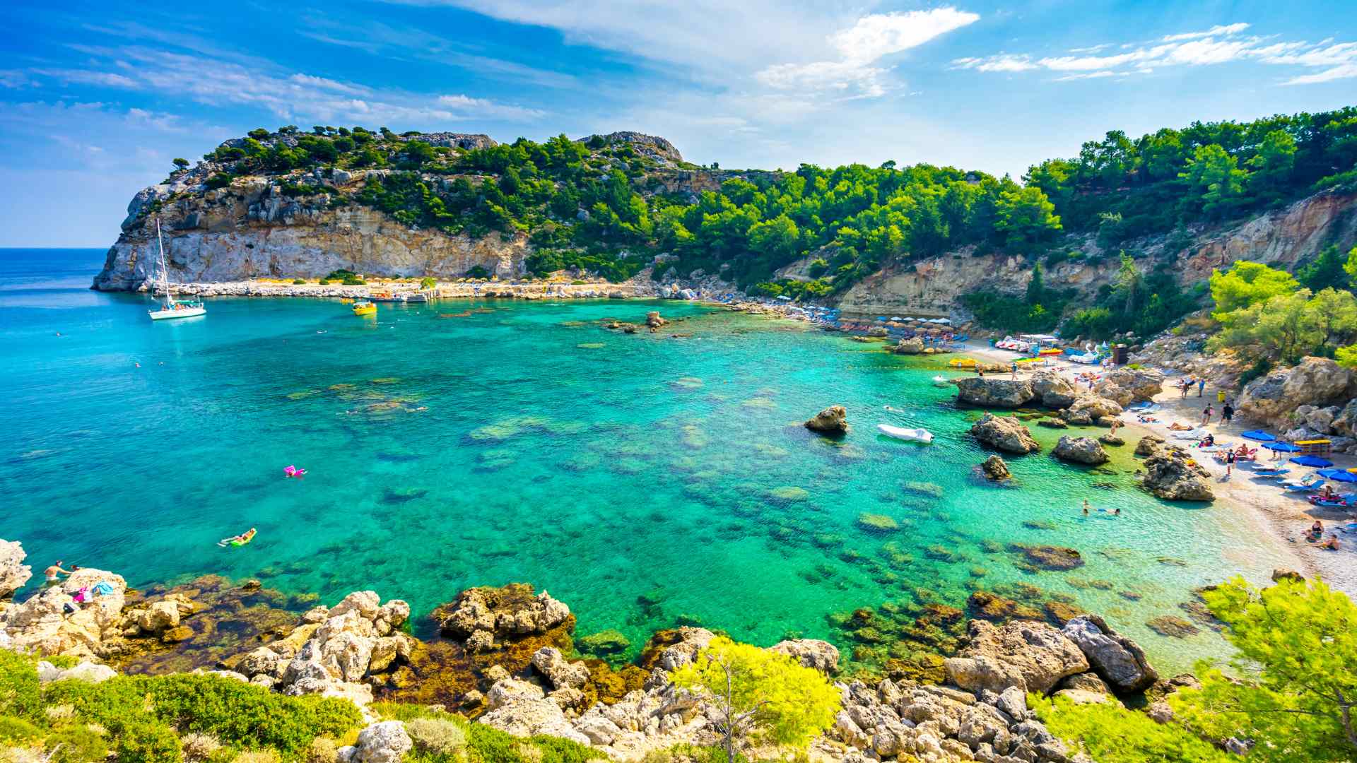 Rocky turquoise bay on the coast of Rhodes, Greece