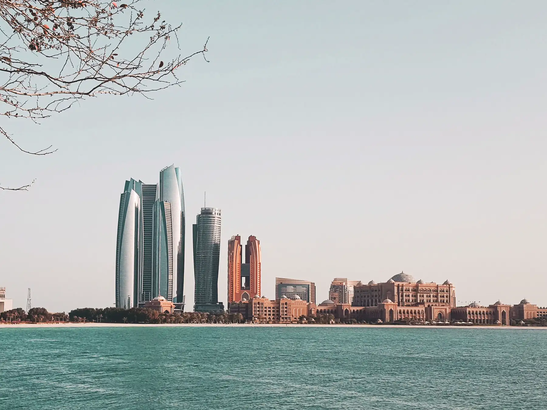 Abu Dhabi skyline and Etihad Towers across the waterfront
