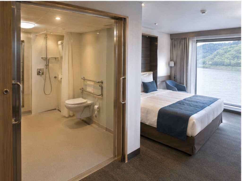 Accessible river cruise cabin with a wide doorway and roll-in bathroom