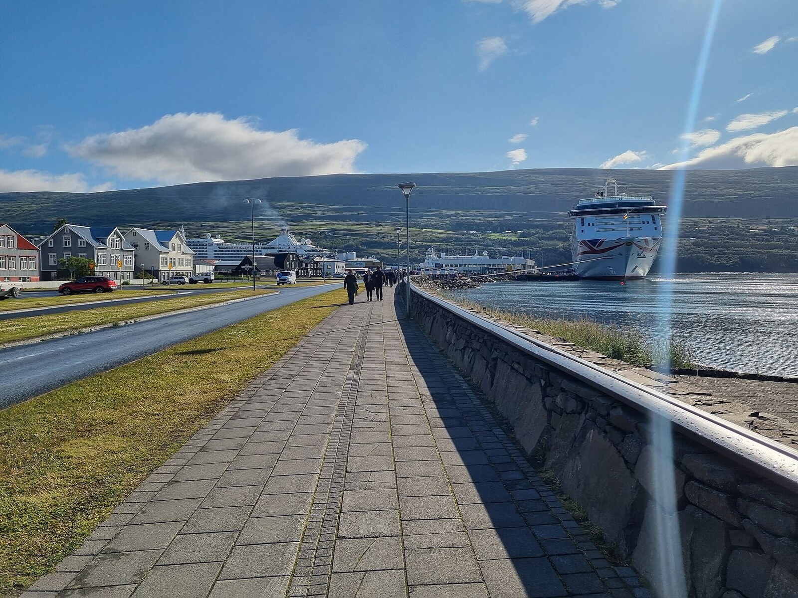Cruise ship docked beside the waterfront promenade at Akureyri cruise port in Iceland