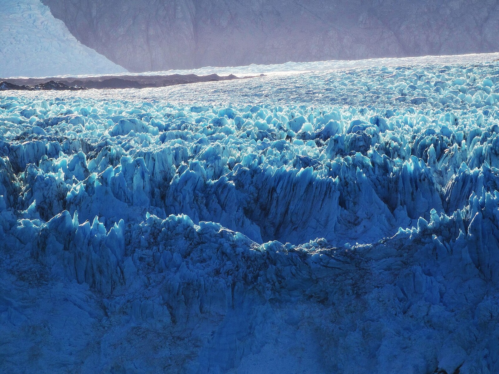 Close view of jagged blue ice and crevasses at Amalia Glacier in Chilean Patagonia
