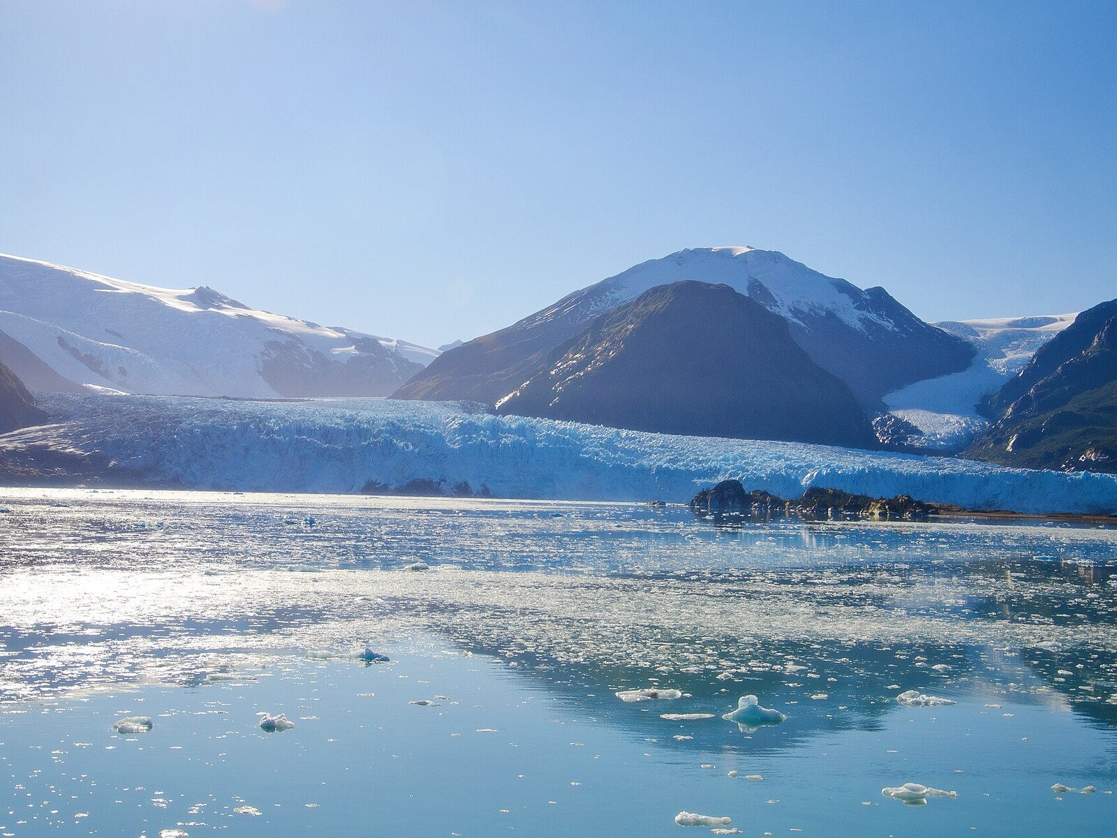 Amalia Glacier flowing into a calm Patagonian fjord in Bernardo O’Higgins National Park, Chile