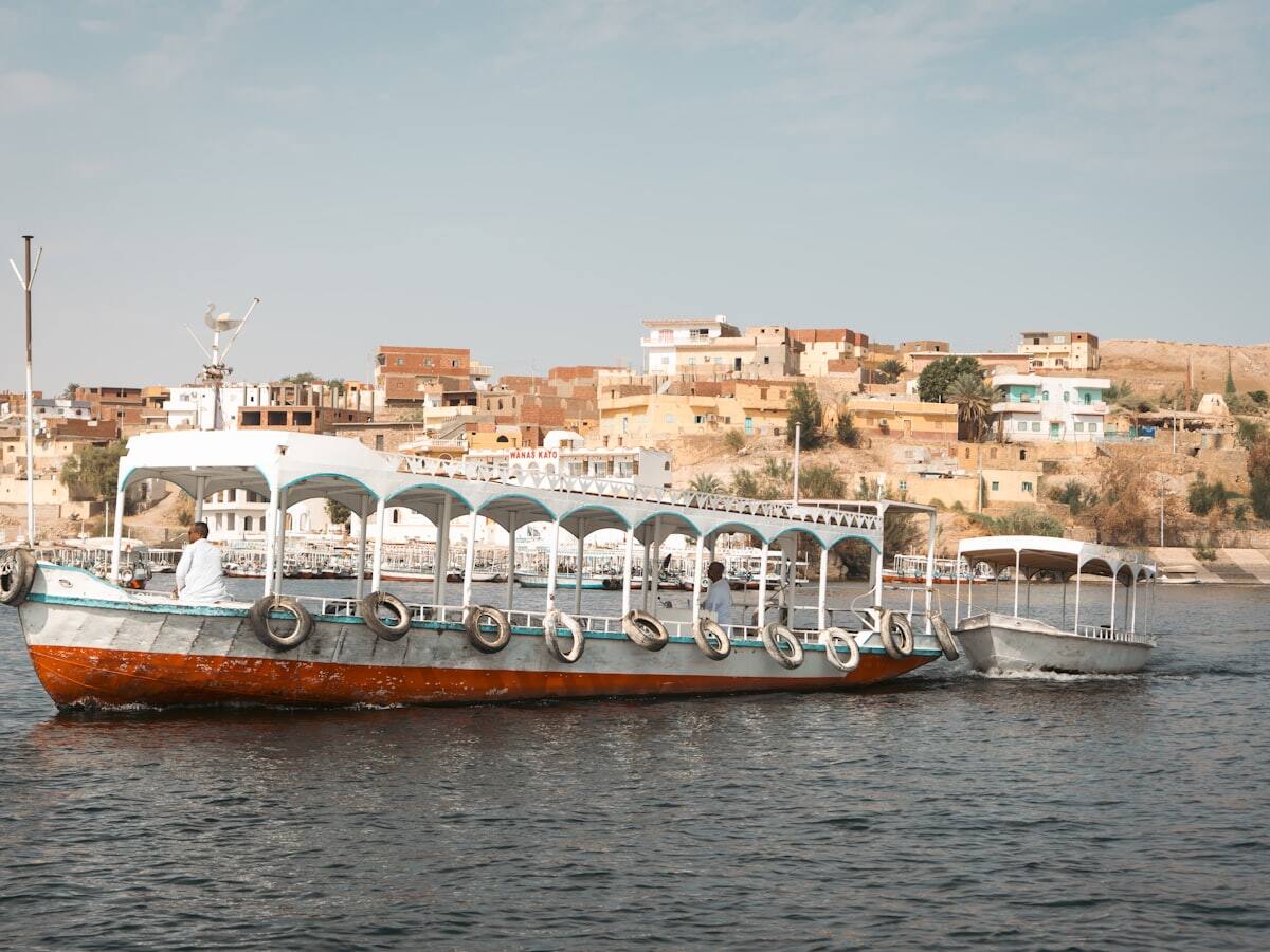 Local passenger boat crossing the Nile in Aswan, Egypt
