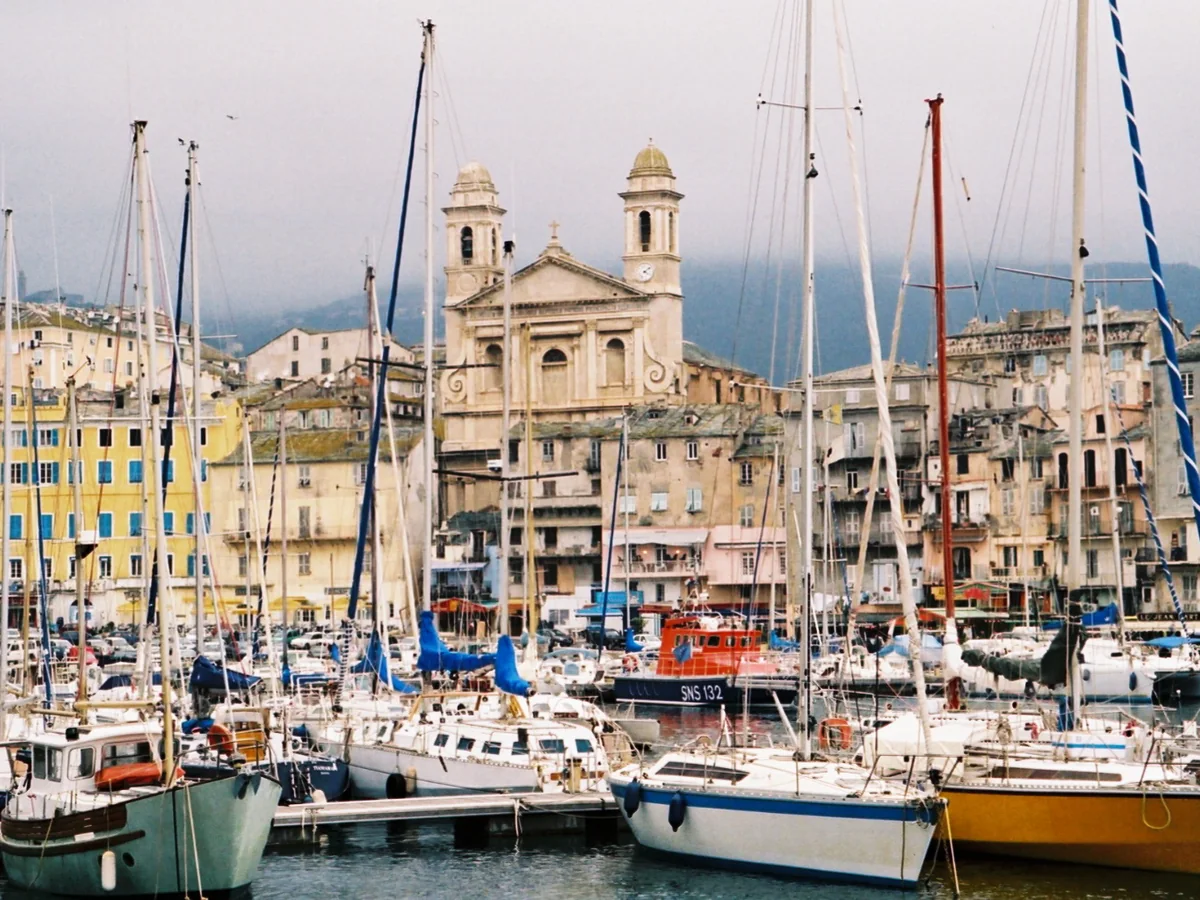 Boats in Bastia harbour with Saint-Jean-Baptiste Church behind them