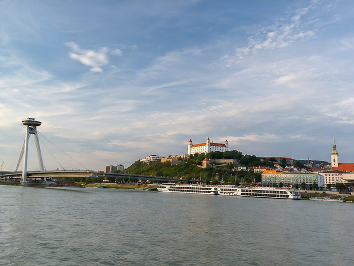Bratislava skyline, castle and UFO Bridge viewed across the Danube River