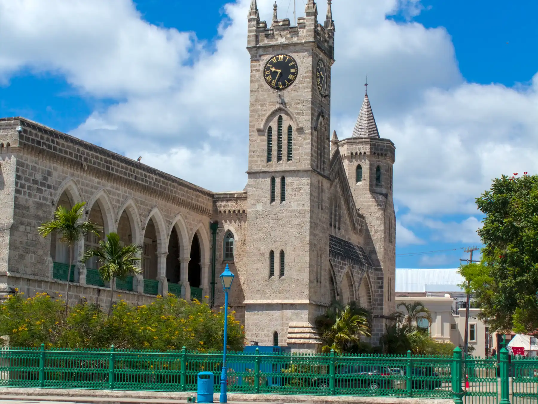 Historic clock tower in Bridgetown under a blue sky