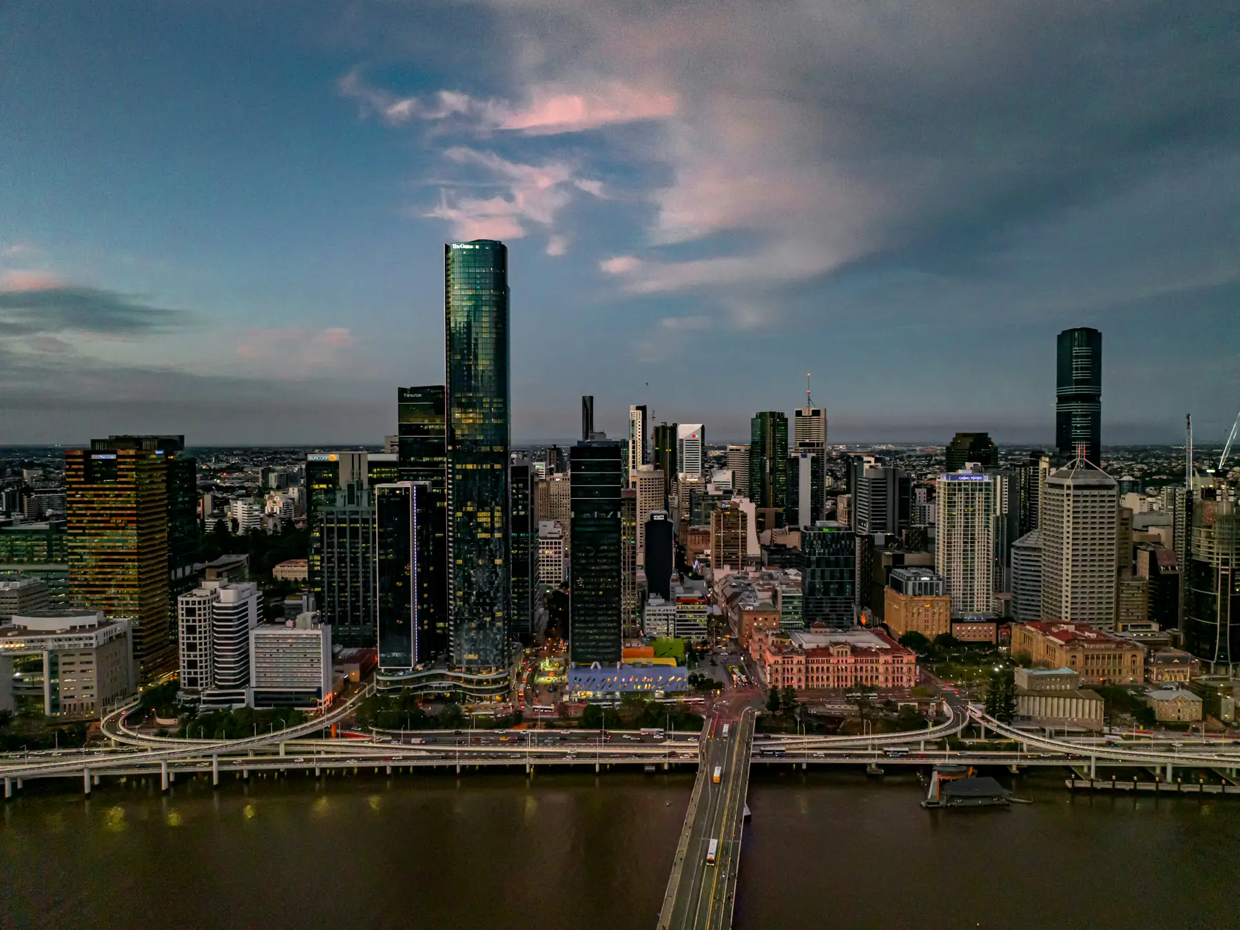 Brisbane skyline and the Brisbane River at dusk.