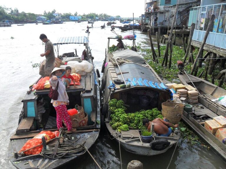 My Tho River Cruise Port: Pagodas, Canals and Coconut Candy