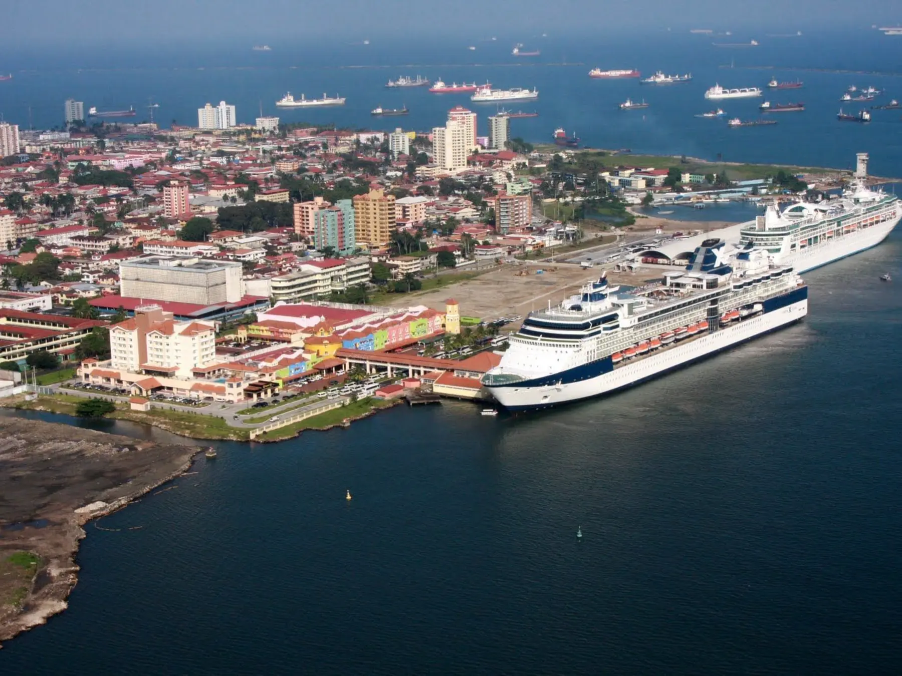 Cruise ships docked along Colón's Caribbean waterfront.