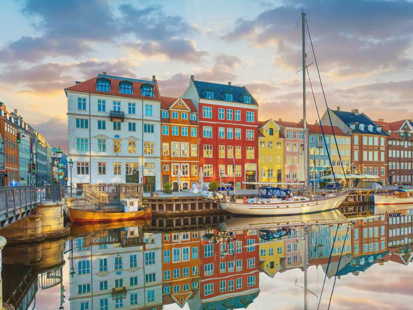 Sailboats in Copenhagen Harbor beside the colorful Nyhavn waterfront