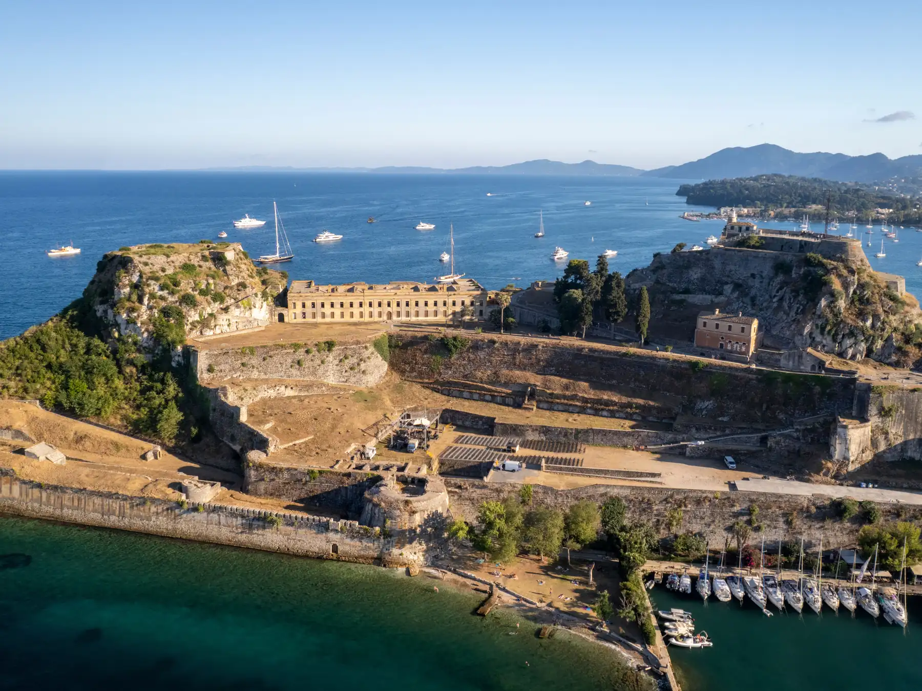 Corfu Old Fortress above yachts moored in the marina