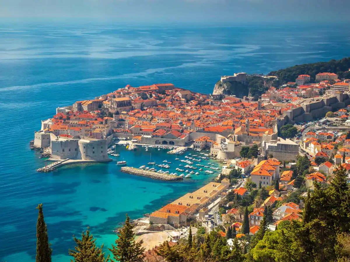 Dubrovnik Old Port beneath the historic city walls in Croatia