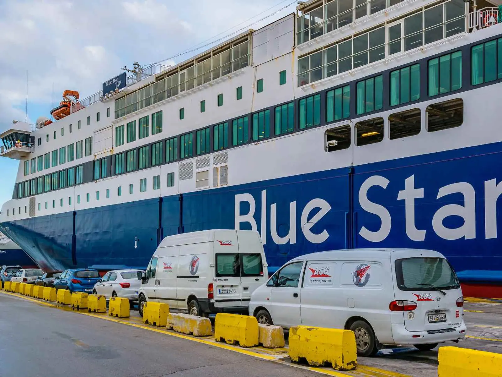 Blue Star ferry loading vehicles in Piraeus