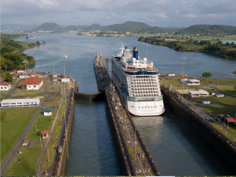 Cruise ship entering the Panama Canal locks viewed from above