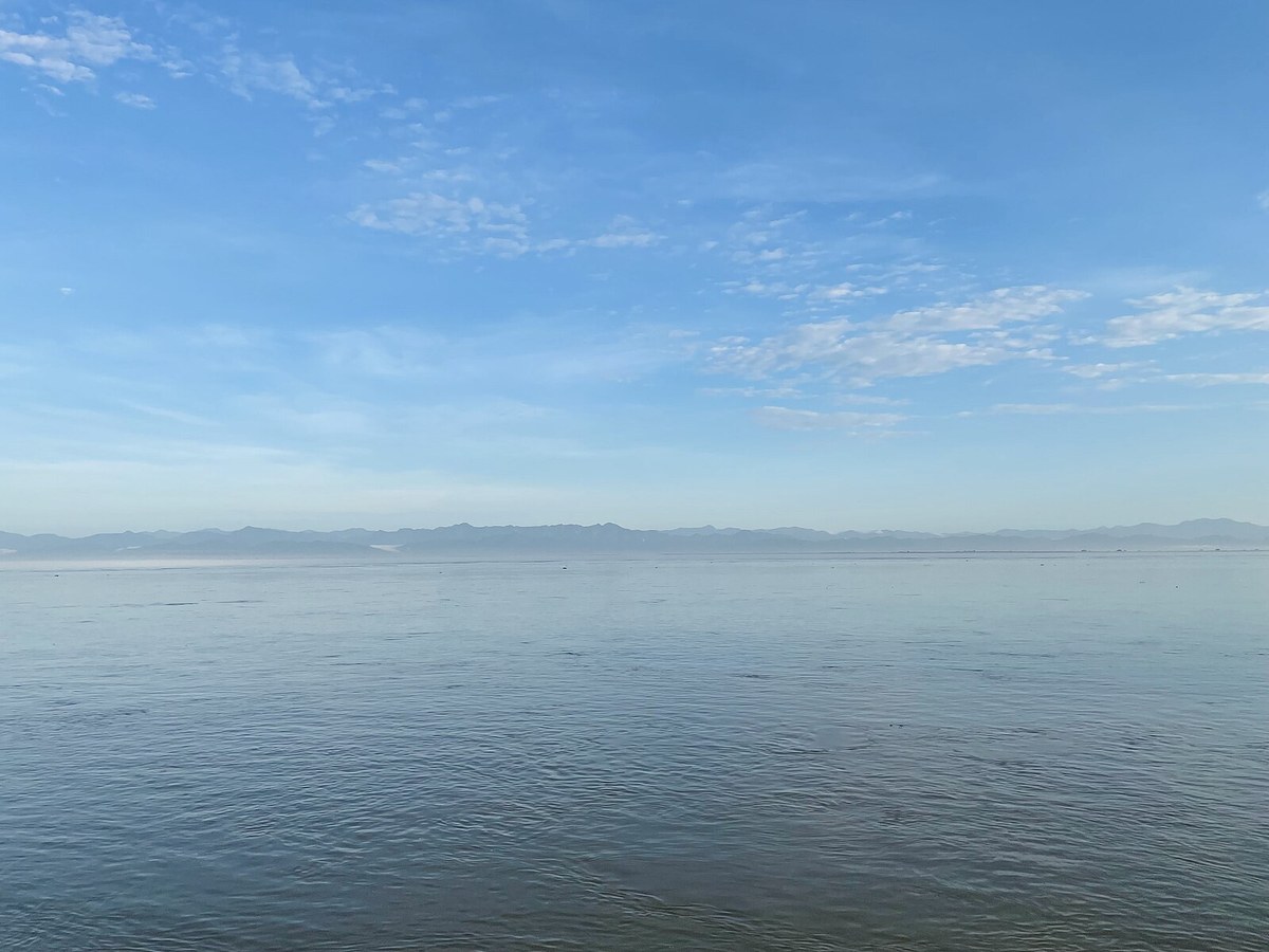 The Arunachal Hills are visible from the bank of the Brahmaputra River near Paltan Bazar, Dibrugarh, on a clear day 01 at Dibrugarh, Assam, India