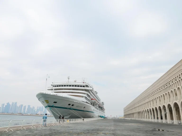 Cruise ship berthed beside the Grand Cruise Terminal at Doha Port