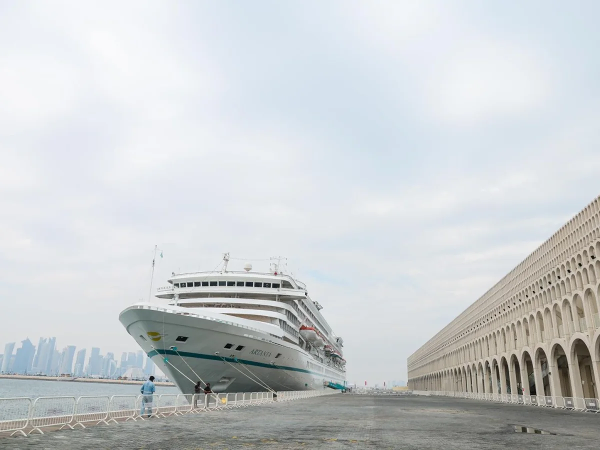 Cruise ship berthed beside the Grand Cruise Terminal at Doha Port