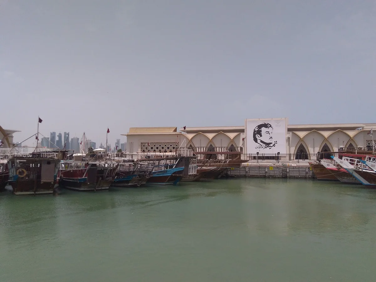 Traditional wooden boats moored at Old Doha Port