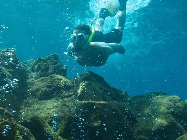 Snorkeler at Champagne Reef in Dominica
