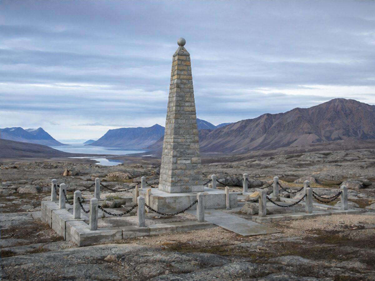 Stone memorial in a rugged Arctic landscape associated with the Franklin expedition