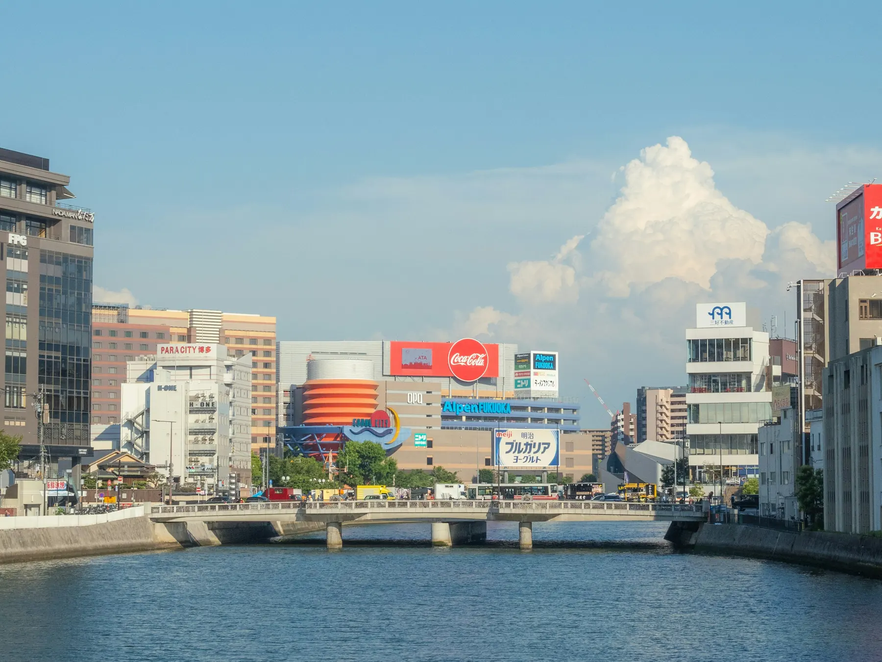 Canal and downtown buildings along the Fukuoka waterfront.