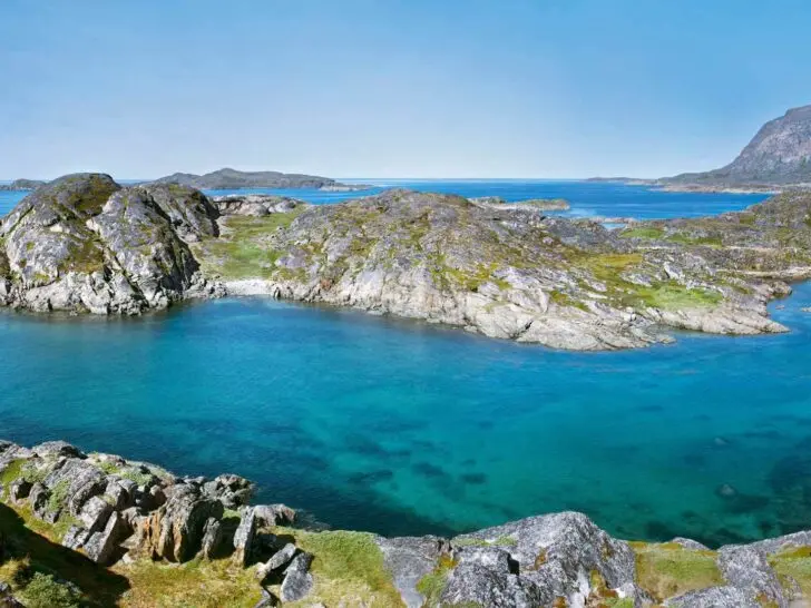 Rocky Arctic shoreline and clear blue water near Sisimiut, Greenland