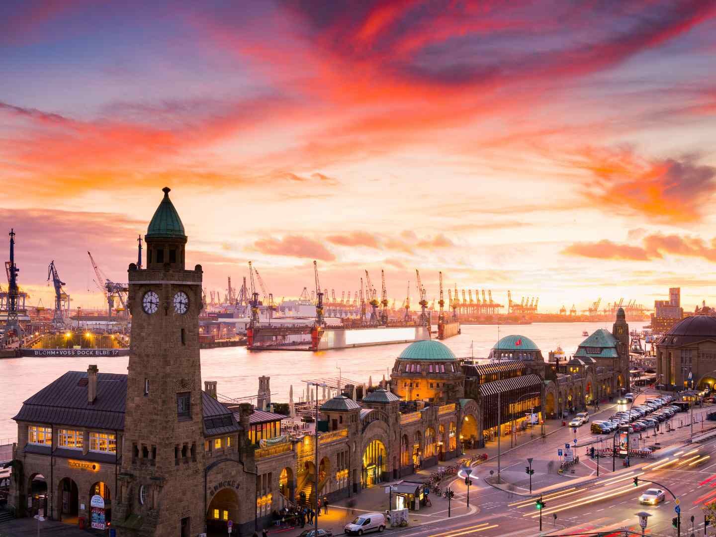 St. Pauli Landungsbrücken on Hamburg Harbor at sunset