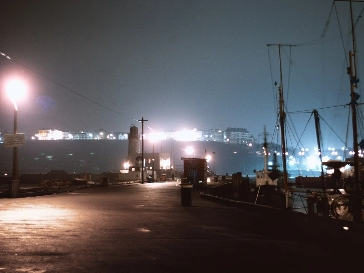 Harwich Old Pier and waterfront illuminated at night