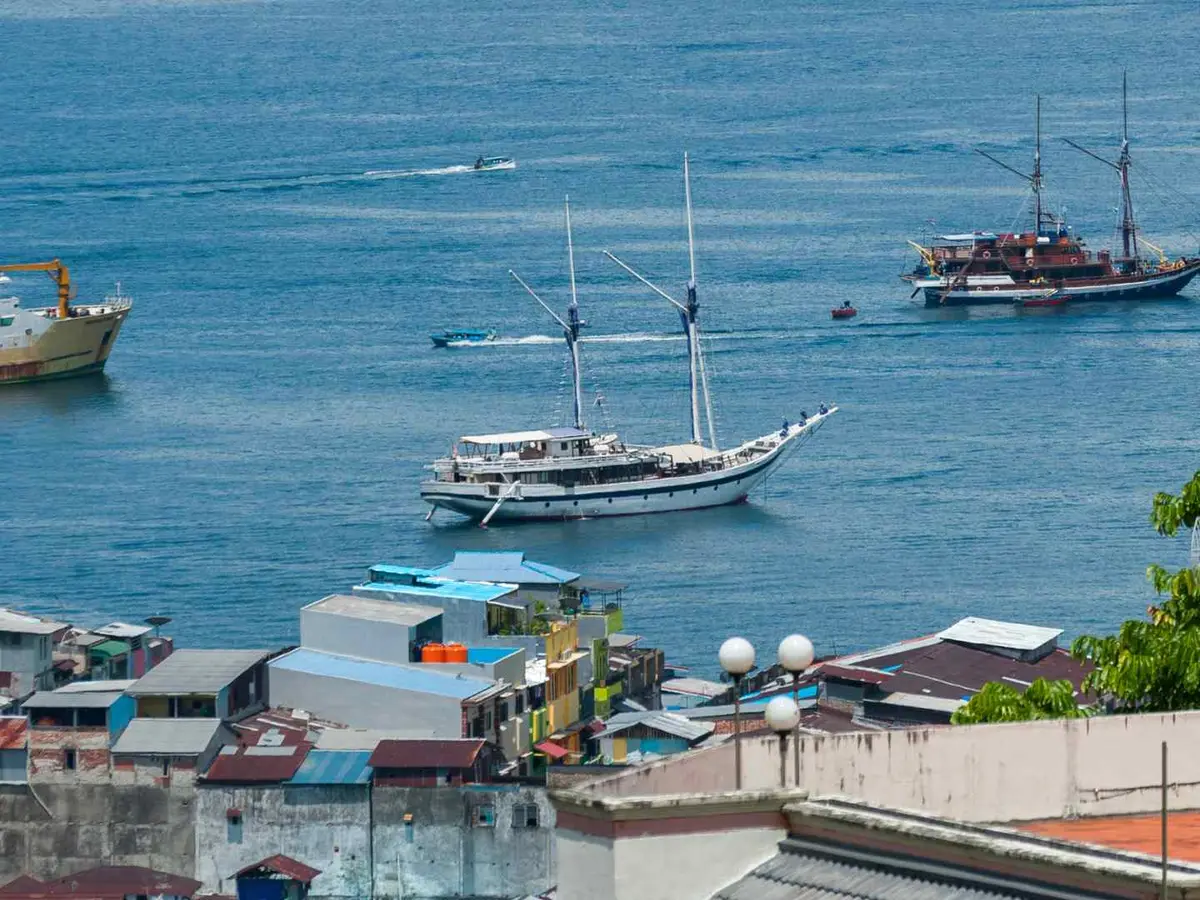Ambon Cruise Port Harbor Traditional boats and ferries in Ambon harbor, Indonesia
