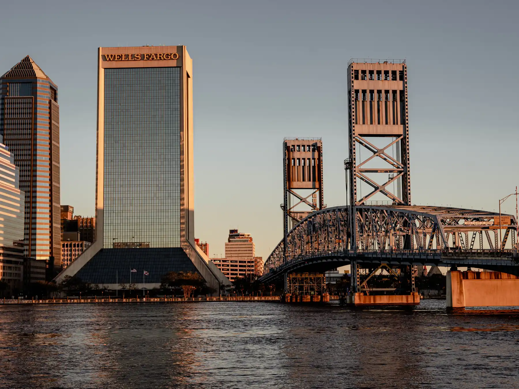 Jacksonville skyline and Main Street Bridge reflected in the St. Johns River.