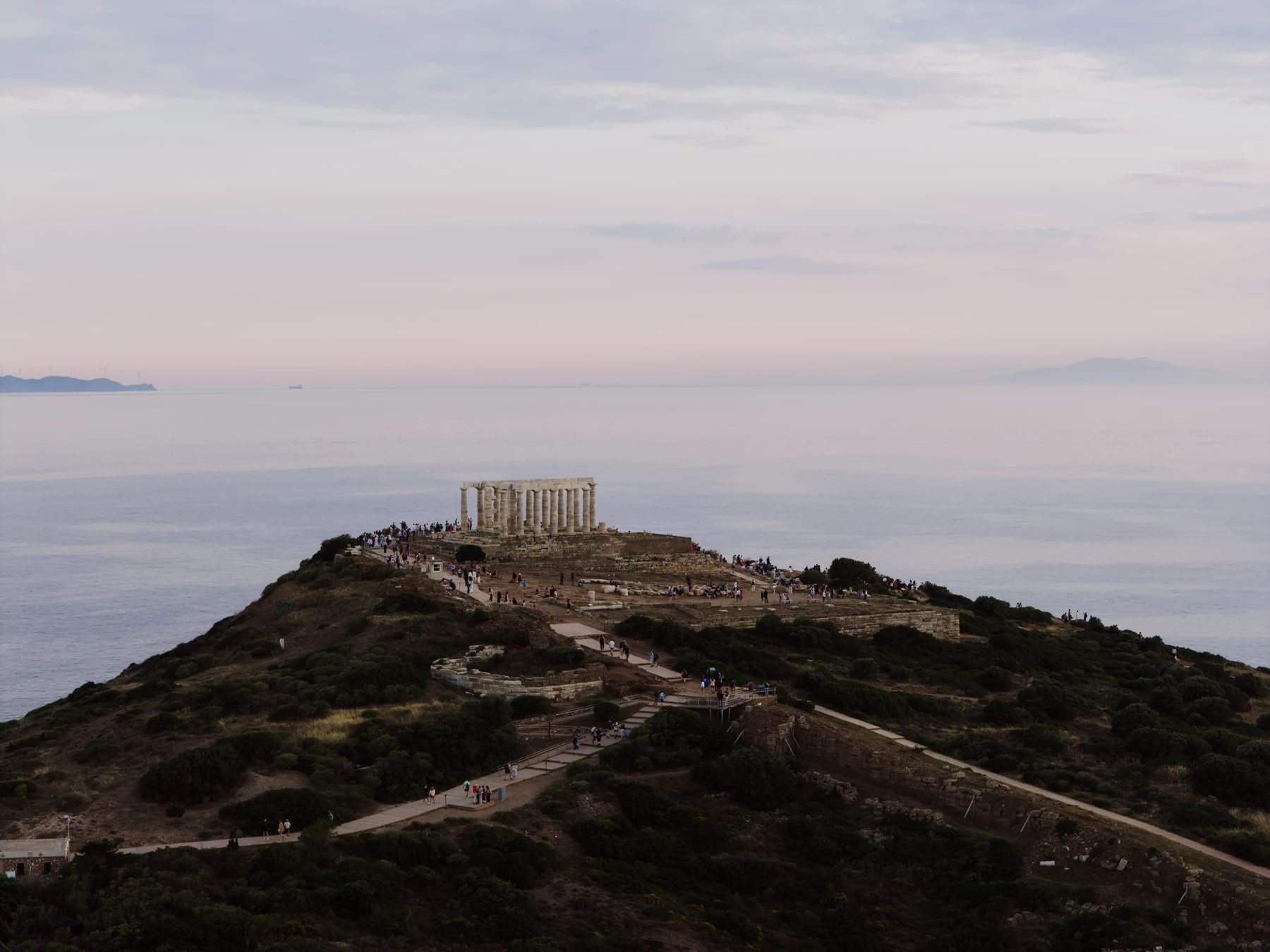 Aerial sunset view of the Temple of Poseidon at Cape Sounion near Lavrion
