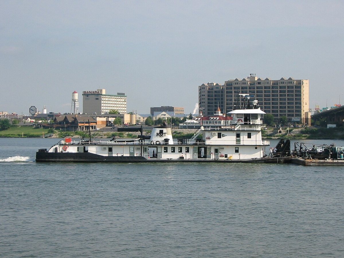 Towboat Magnolia on the Ohio River with the Louisville-area waterfront beyond