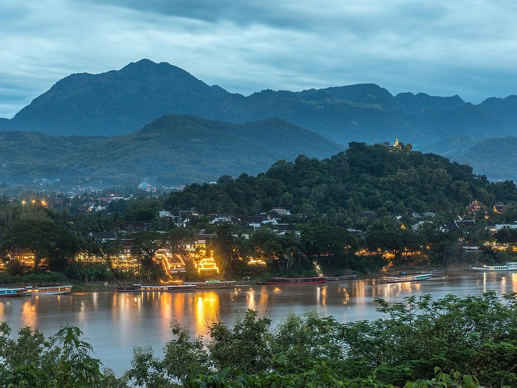 Luang Prabang Mekong riverbank and boats at sunset