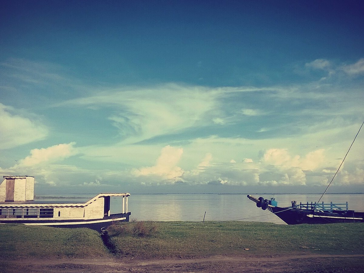 Boats on riversides of Kamalabari, Majuli at Majuli and Nimati Ghat, Assam, India