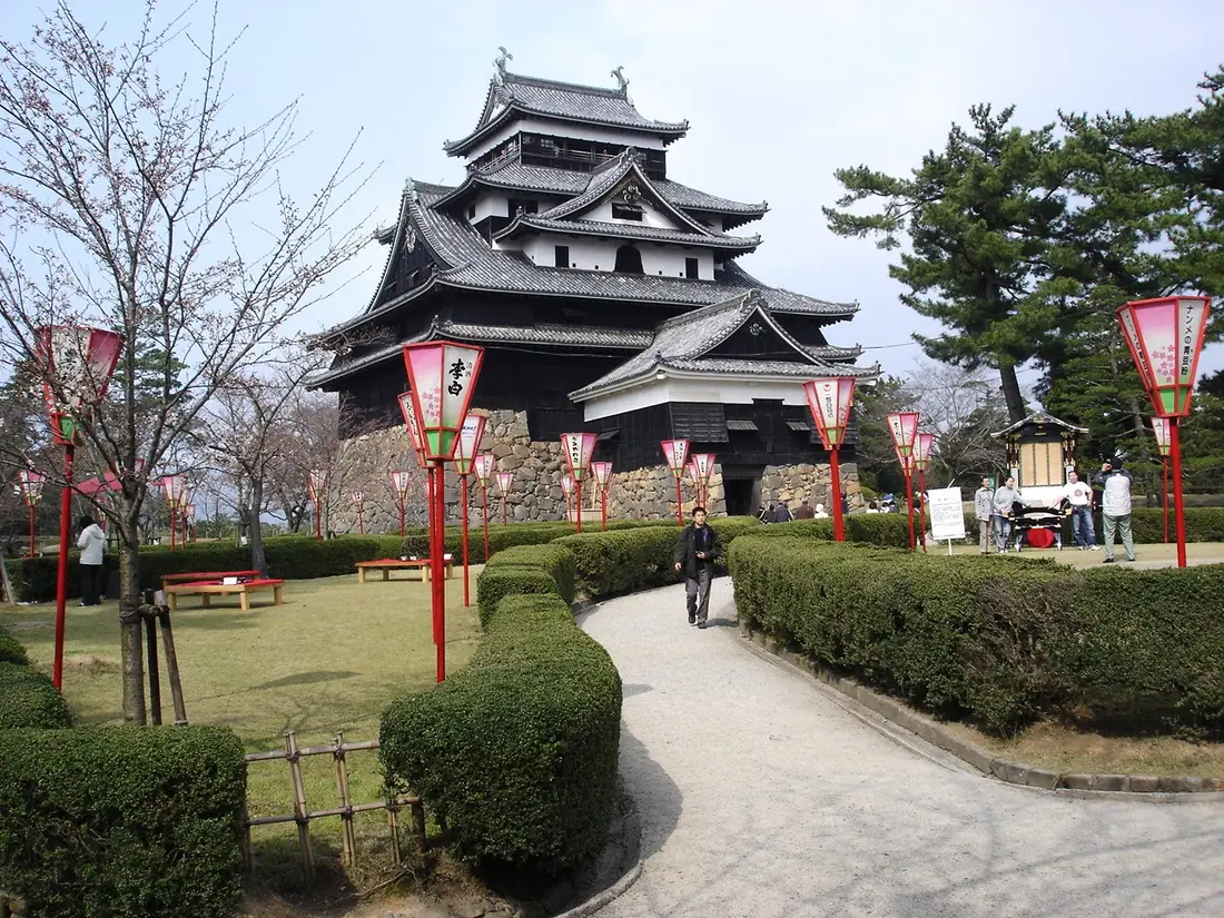 Black wooden keep and gardens at Matsue Castle near Sakaiminato