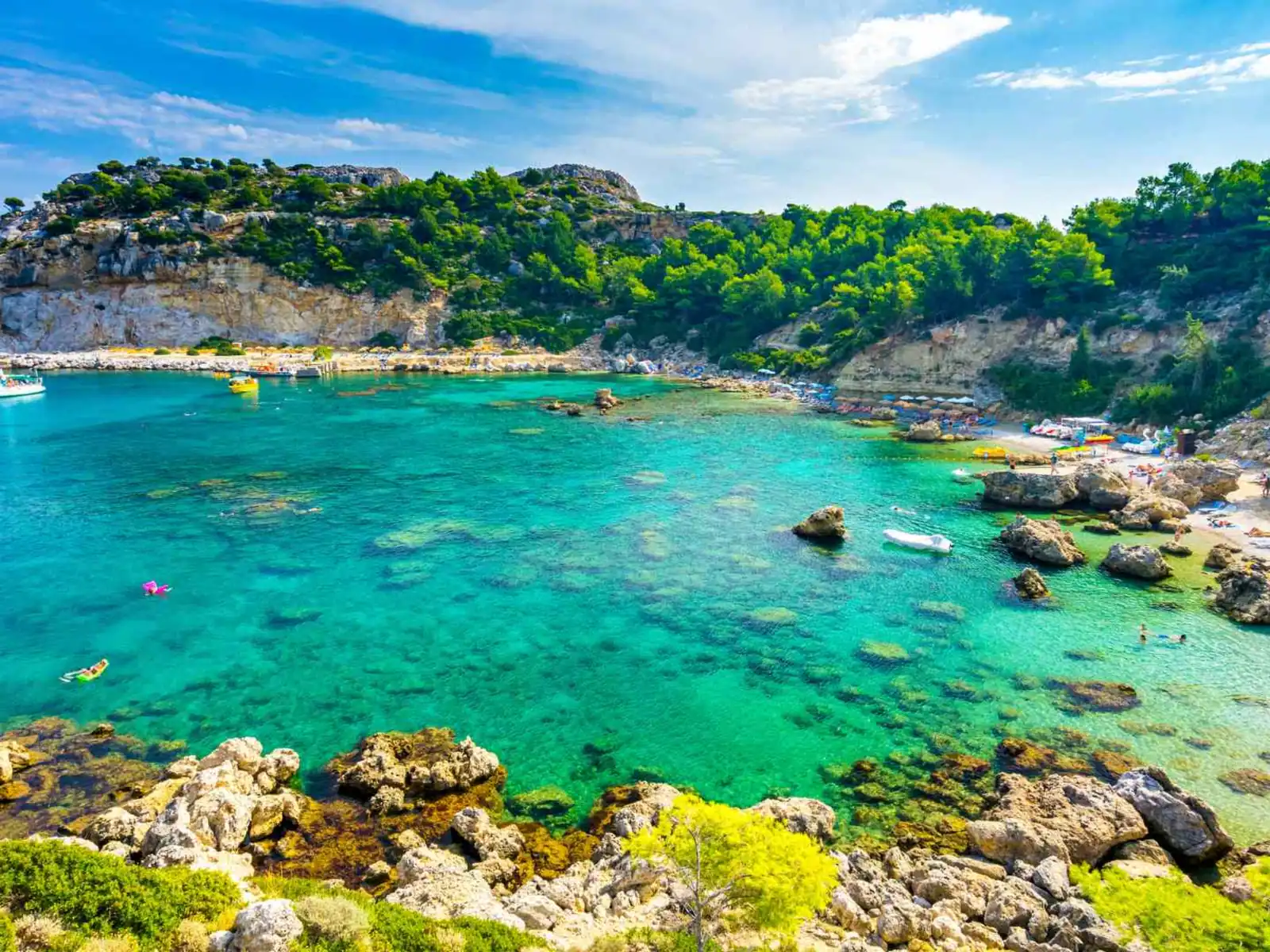 Rocky turquoise bay on the coast of Rhodes, Greece