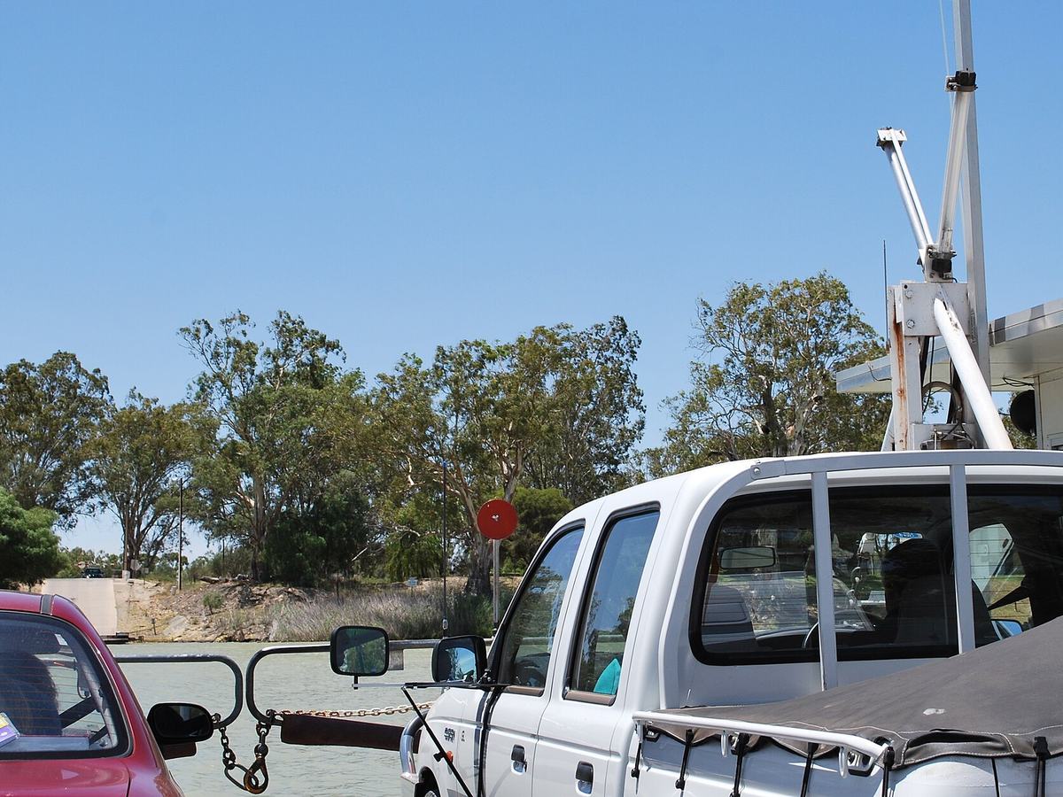 Vehicles aboard the Morgan cable ferry crossing the Murray River