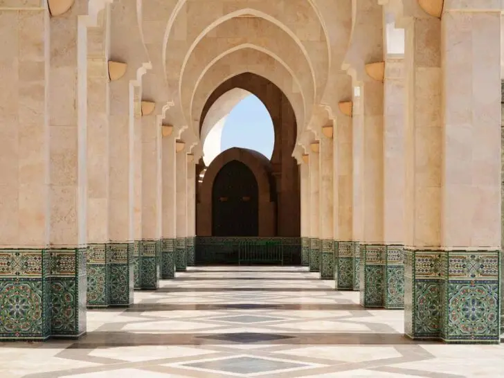 Arches and tilework inside the Hassan II Mosque complex in Casablanca