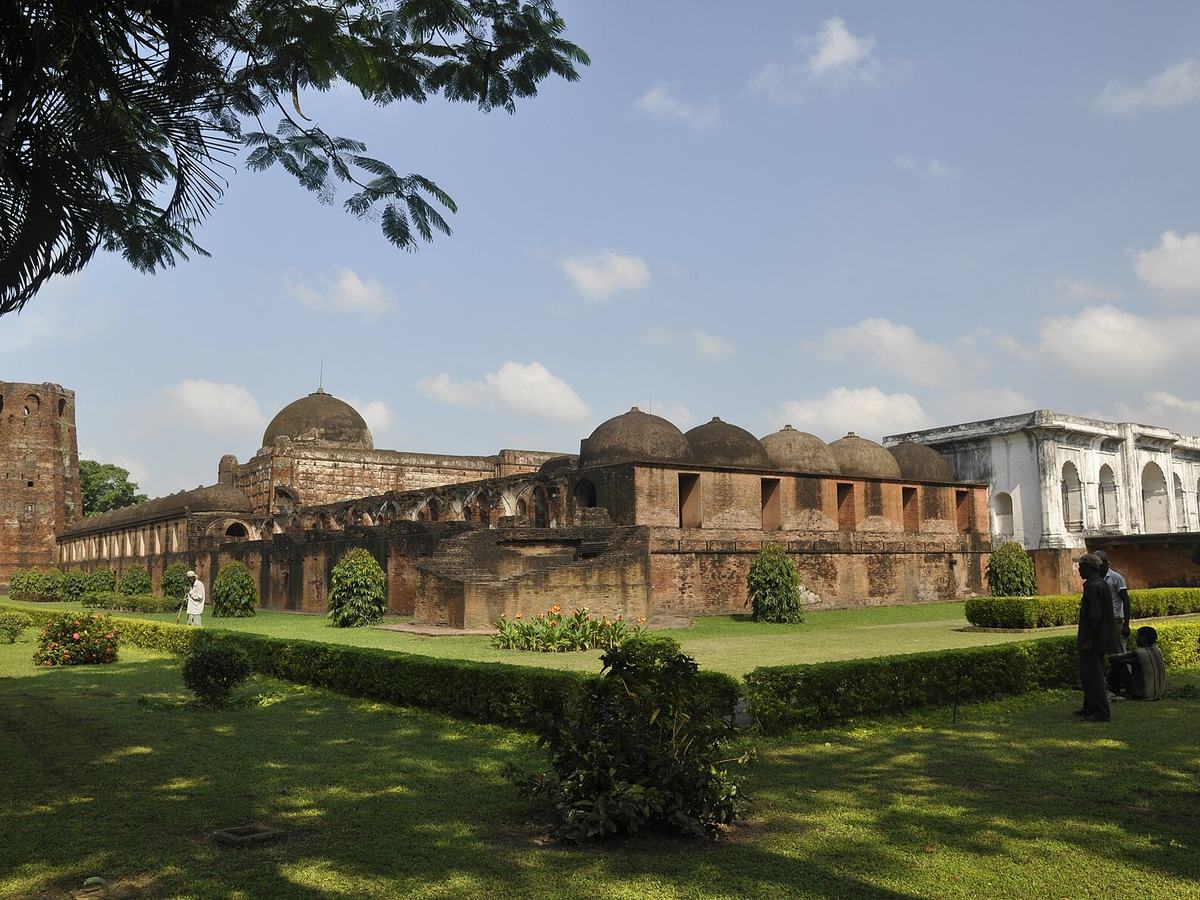 Historic brick domes and garden at Katra Mosque in Murshidabad