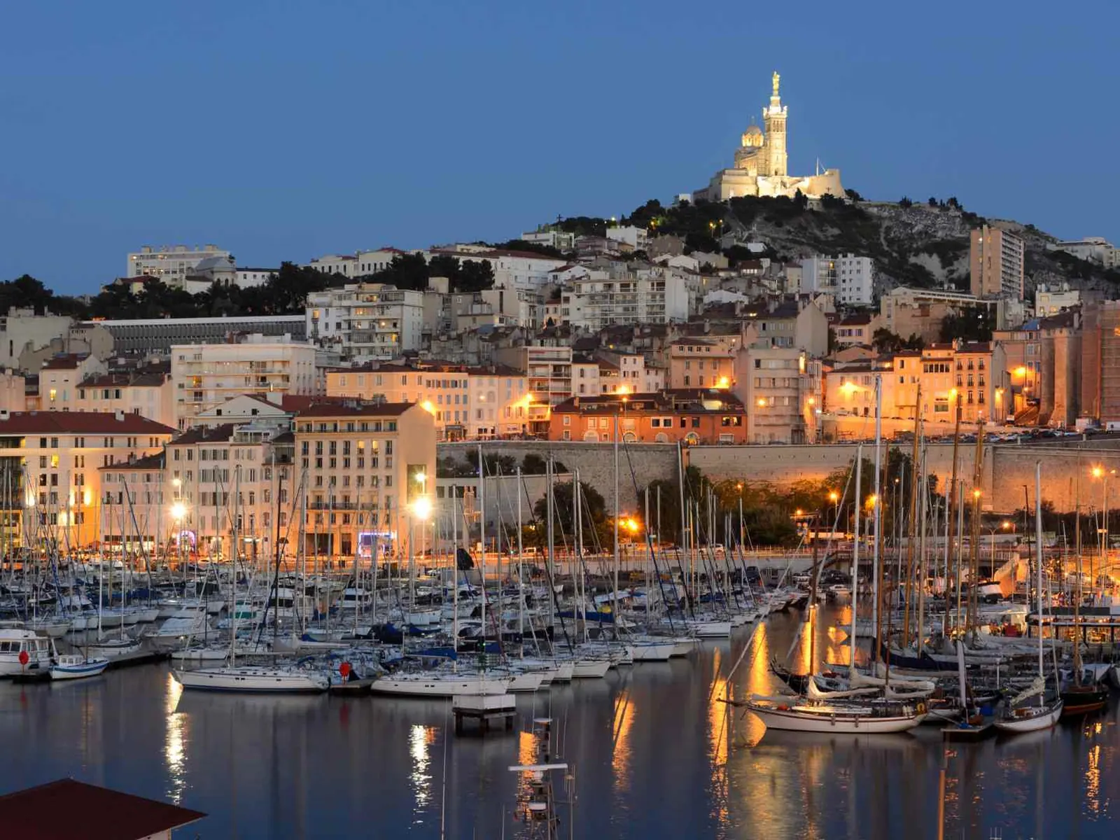 Marseille Old Port and Notre-Dame de la Garde at dusk