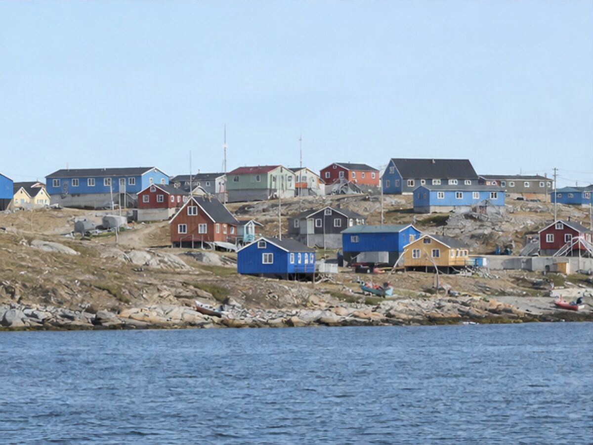 Colorful houses along the waterfront of a remote Nunavut hamlet