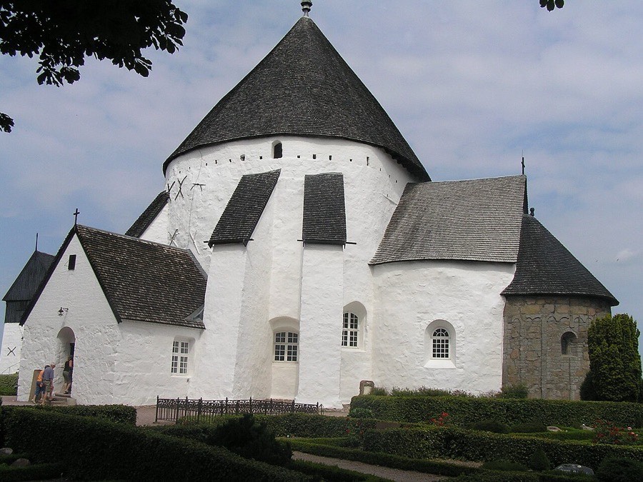 White medieval Østerlars Round Church with its dark conical roof on Bornholm