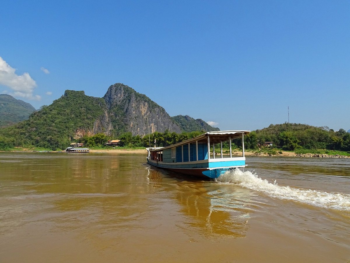 Passenger boat traveling on the Mekong River in Laos