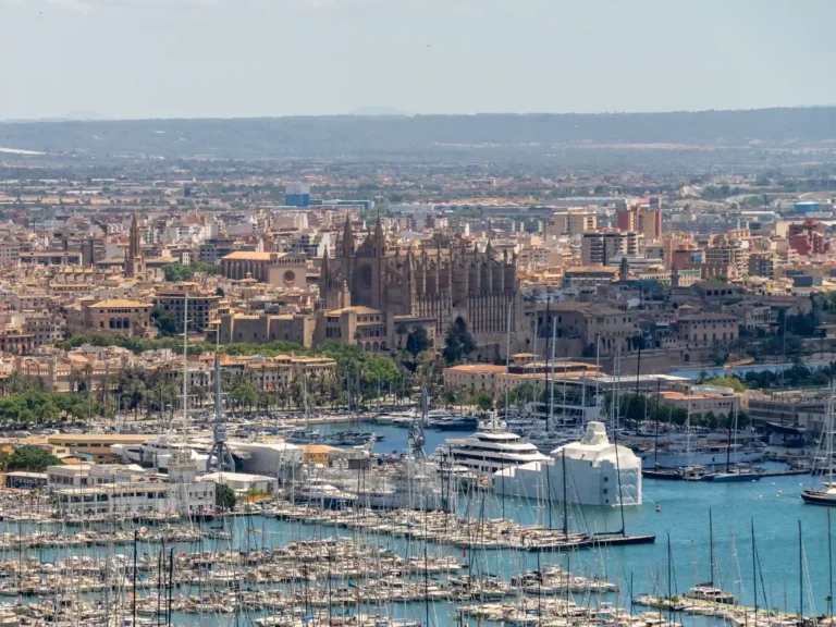 Palma de Mallorca marina with La Seu Cathedral and the city skyline behind it.