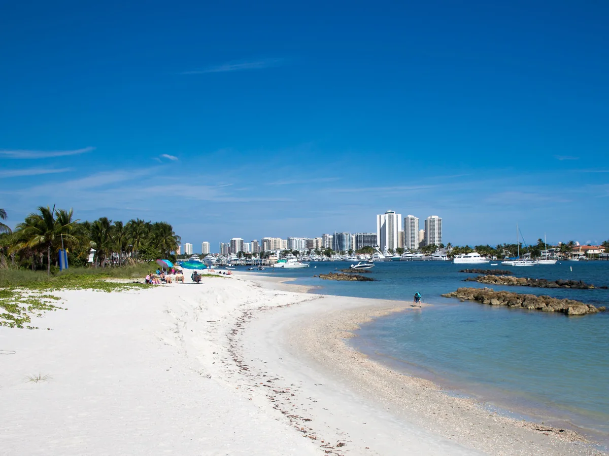 Sandy barrier island shoreline with turquoise water