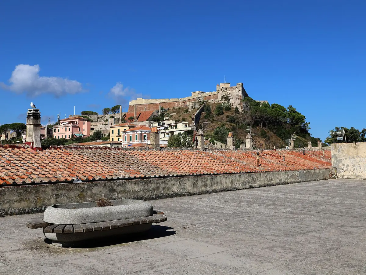 Forte Falcone rising above the tiled roofs of Portoferraio