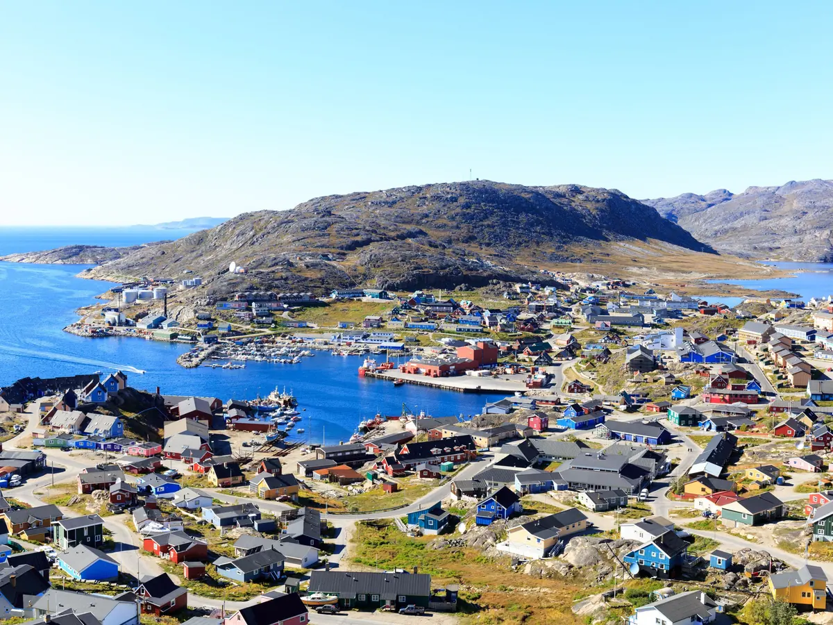 Colorful houses and working harbour in Qaqortoq, Greenland