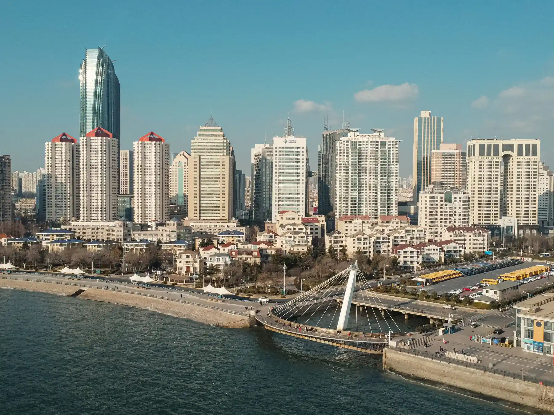 Aerial view of Qingdao city skyline along the coastline