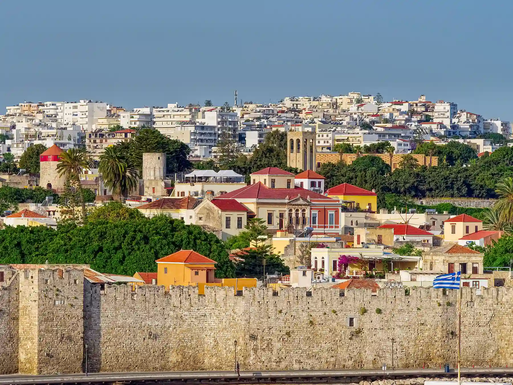 Rhodes Old Town buildings behind the medieval city walls